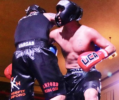 Sterling Ingram, also of NAS Lemoore, battles Hanford Police Officer DJ Vargas in a finals bout.
